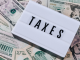 perbedaan pajak dan retribusi